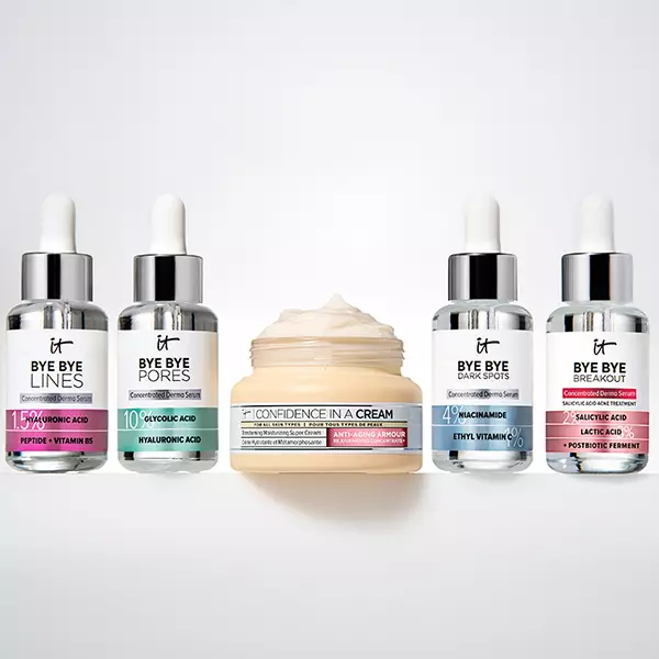 4 bottles of serum and Confidence in a Cream in the middle of the 4 bottles.