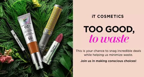 Flat-lay of IT Cosmetics products on pine leaves beside a pink background with text about deals and reducing product waste.
