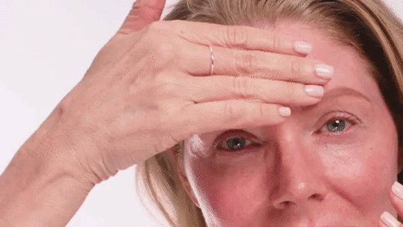 A GIF showing a model applying the product